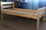 Кровать из древесины хвойных пород